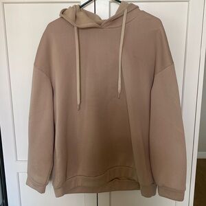 Tan sweatshirt never worn.